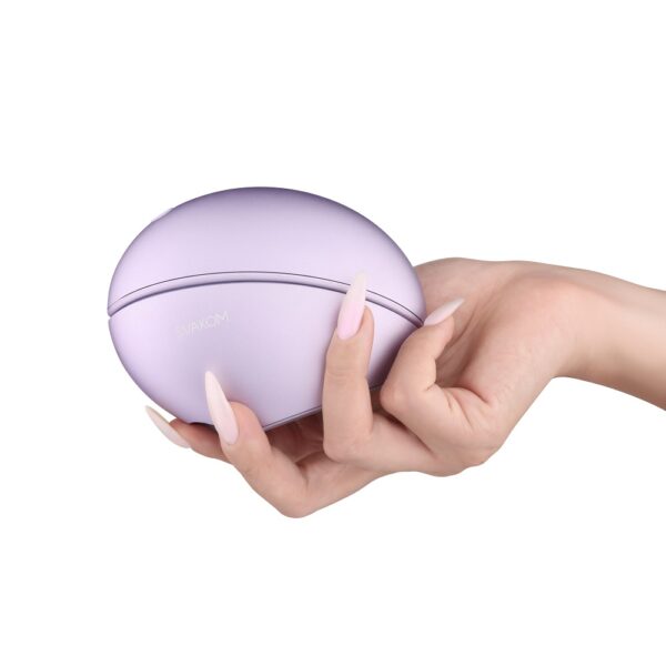 Svakom Galaxie Suction Vibrator with Mood Projector - closed in hand